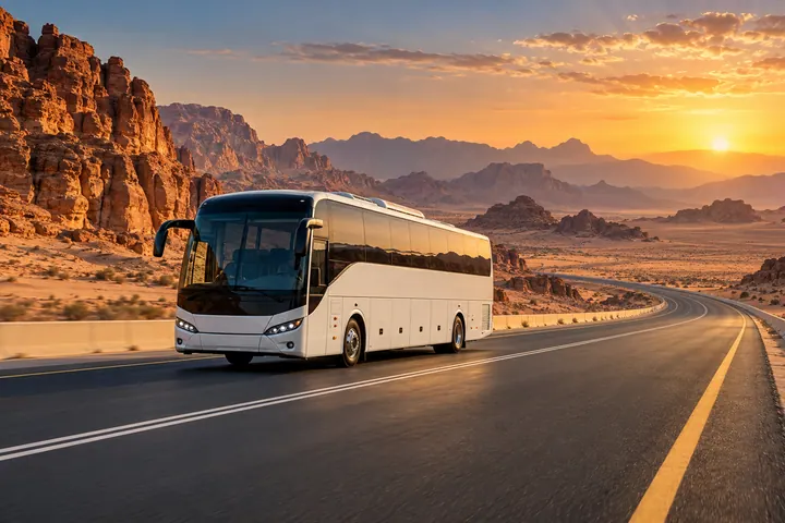 Passenger coach travelling on a Saudi desert road